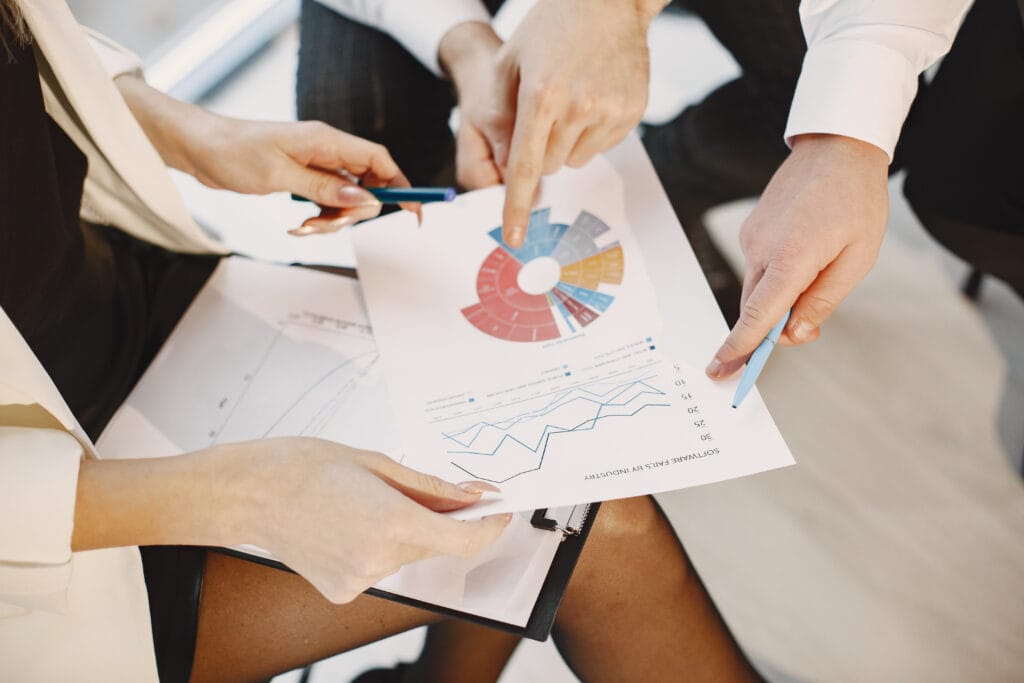 Young team working together and use the laptop